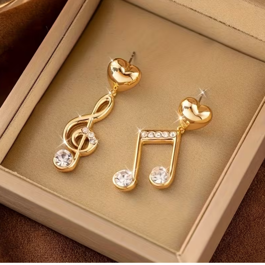 Par de Aretes Dorados en Forma de Notas Musicales