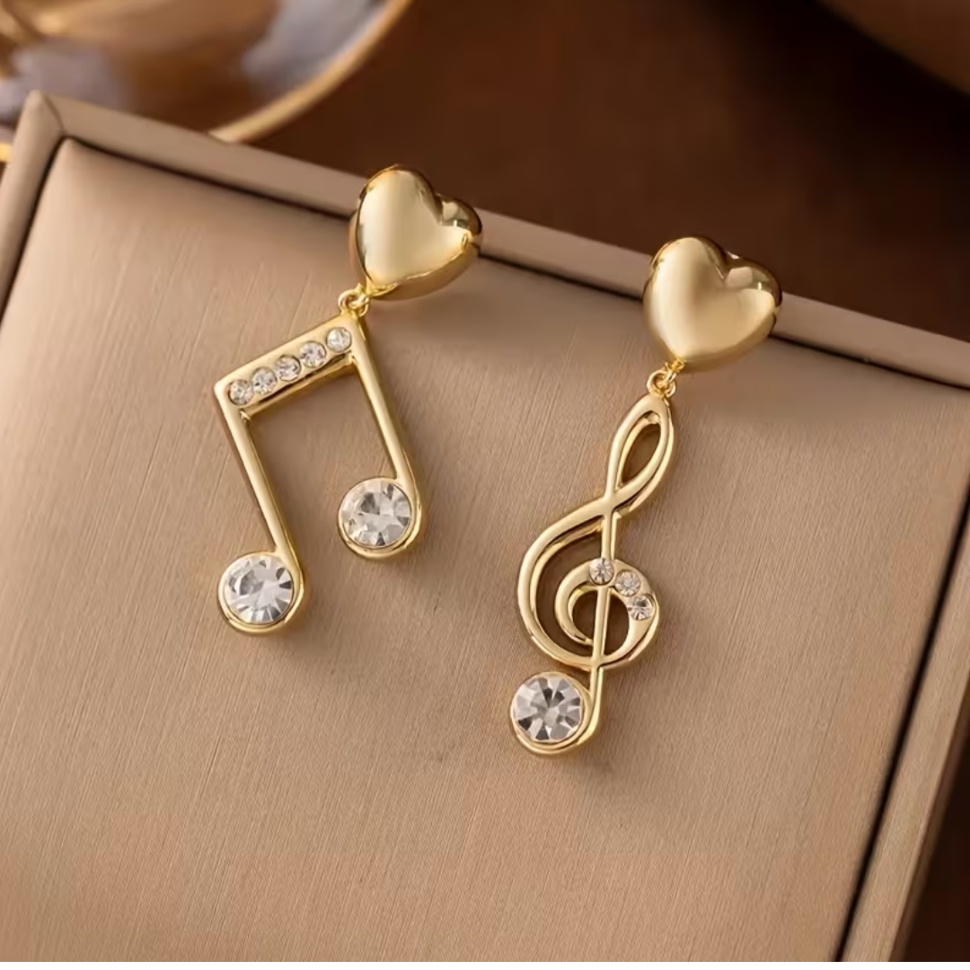 Par de Aretes Dorados en Forma de Notas Musicales