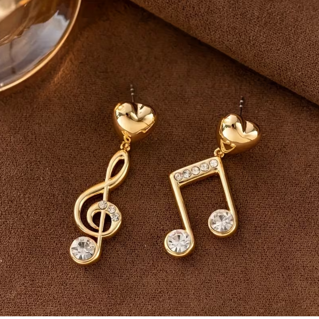 Par de Aretes Dorados en Forma de Notas Musicales